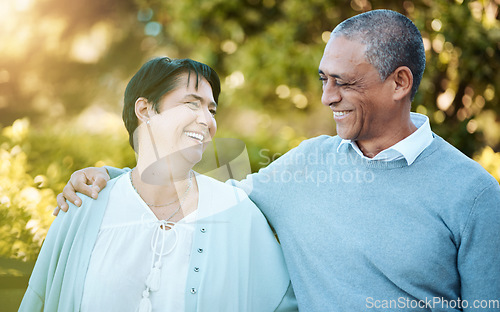 Image of Love, smile and senior couple in park laughing for comic, comedy or funny joke in conversation. Happy, nature and elderly man and woman in retirement talking, bonding and having fun together in field