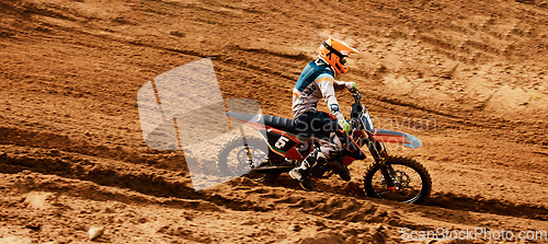 Image of Motorcycle, freedom and speed with a sports man on space in the desert for dirt biking. Bike, fitness and power with a person driving fast on an off road course for a performance challenge on sand