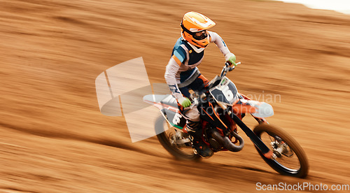 Image of Motorcycle, balance and motion blur with a sports man on space in the desert for dirt biking. Bike, fitness and power with a person driving fast on an off road sand course for freedom or speed