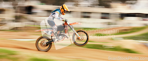 Image of Motorcycle, balance and motion blur with a man on space at a race course for dirt biking. Bike, fitness and power with a person driving fast on sand or off road for freedom, performance or challenge