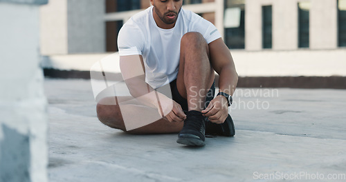 Image of Fitness man, floor and tie shoes lace, sneakers and start exercise, training challenge or race workout, practice or activity. Running footwear, sportswear and urban runner prepare for sports cardio