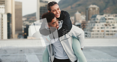 Image of Fitness, piggyback and couple in a city with love, hug and bind in training or cardio routine. Sports, love and man with woman outdoor for workout, challenge or exercise, happy and embrace in town