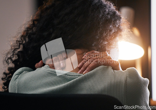 Image of Neck pain, back and woman with stress, anxiety and work burnout in office at night. Tired, massage and muscle injury and female professional hand with tension and health problem of a worker shoulder