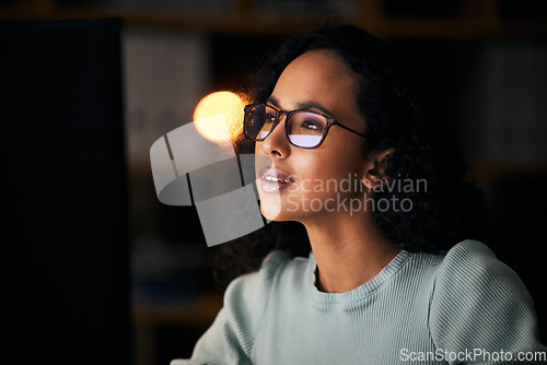 Image of Student, woman and computer for night reading, online education or university research in dark. Young person on desktop, glasses reflection or vision for online studying, college deadline or planning