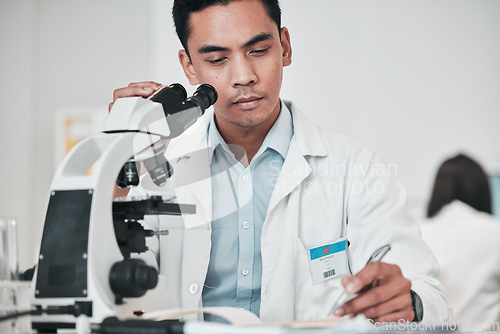 Image of Science, microscope and man writing data, test results and research report for medical analysis of DNA in laboratory. Biotechnology scientist or doctor with checklist, documetns or healthcare study