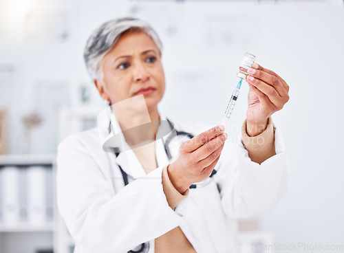 Image of Vaccine injection, doctor and woman with bottle, healthcare safety and immunity in clinic. Mature medical worker with needle, vial and medicine container for help with virus, vaccination and flu shot