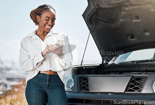 Image of Car insurance, phone or happy woman in city with an engine crisis on road typing a message for help. Online, mobile app or African driver by a stuck motor vehicle with smile texting on social media
