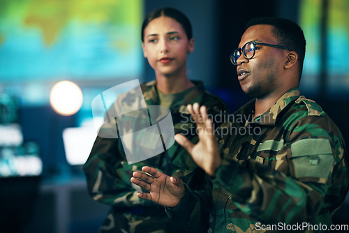 Image of Night, talking and people in army with a strategy, cyber security or military communication. Data center, war and a black man speaking to a woman about government secret, surveillance or system