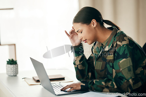 Image of Headache, laptop or woman soldier with trauma and depression at desk with anxiety or stress. Frustrated, psychology or sad person with army memory, military frustration or ptsd crisis typing online