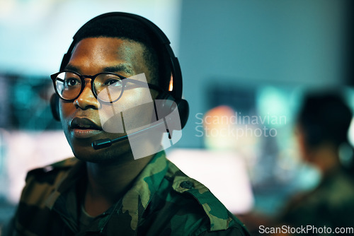 Image of Call center, man and face with microphone and glasses for information technology, big data or intelligence agency. Cyber security, person and focus for communication, analysis and support to army