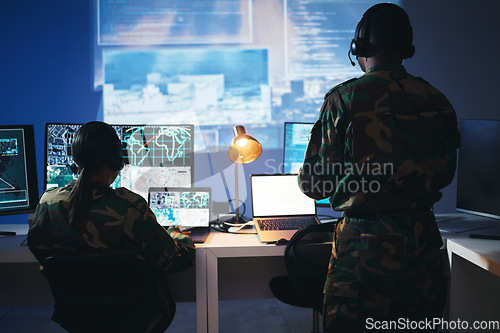 Image of Control room, military and people on computer for surveillance, tracking operation and national security. Army, government and soldiers online for cybersecurity, communication network and monitoring