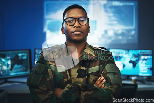 Image of Military, surveillance and portrait of man with arms crossed in security, control room and monitor government, operation or mission. Army, employee and face with pride, confidence and working in tech