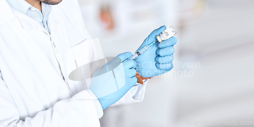 Image of Hands, healthcare a vaccine with a doctor in the hospital closeup for treatment or cure using a syringe. Medical, needle and injection with a medicine professional in a clinic for pharmaceutical care