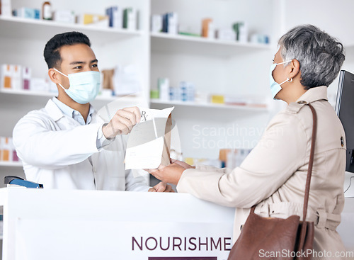 Image of Pharmacist, package and customer in face mask for healthcare support, service and virus compliance in store. Medical doctor and sick patient with paper bag, covid medicine and pharmacy or clinic desk