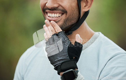 Image of Smile, nature and a person with a glove for fitness, sports or exercise in a park. Happy, travel and an athlete or man ready to start a workout, training or cardio in summer for outdoor health