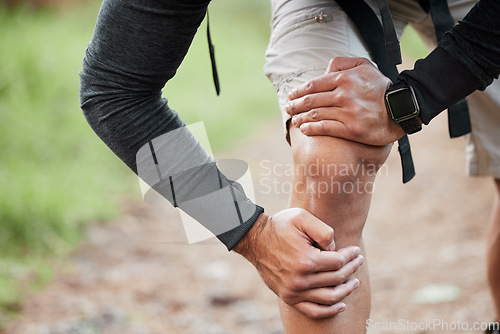 Image of Knee pain, injury and person hand in park with fitness, workout and training accident from hike. Runner, leg massage and fail from trekking in the woods on a trail with muscle strain and emergency