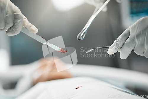 Image of Surgery, doctors hands on tools and blood on equipment, teamwork and support in healthcare hospital. Nurse helping medical surgeon, safety and patient in bed for operation, emergency procedure in ER.