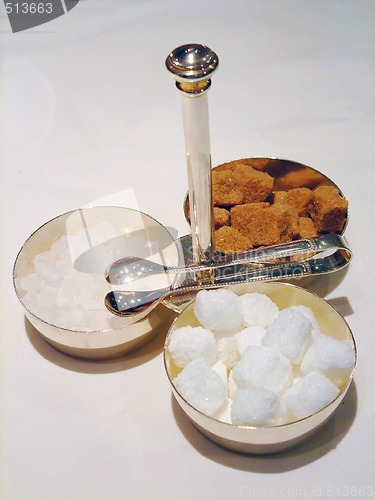 Image of Bowls with cane sugar, white sugar and candy sugar 