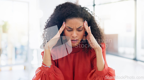 Image of Laptop, typing and business woman with headache, pain or feeling sick in office workplace. Mental health, stress and exhausted female employee with burnout, depression or fatigue, anxiety or migraine