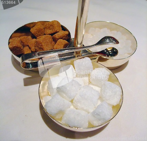 Image of cane sugar, white sugar and candy sugar cubes