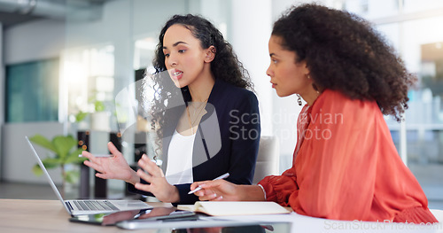 Image of Coaching, training and woman with mentor writing, learning and taking notes in office. Laptop, teaching and manager talking, explain and helping intern with notebook, project and business report.