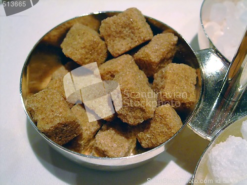 Image of Bowl of brown and cane sugar cubes