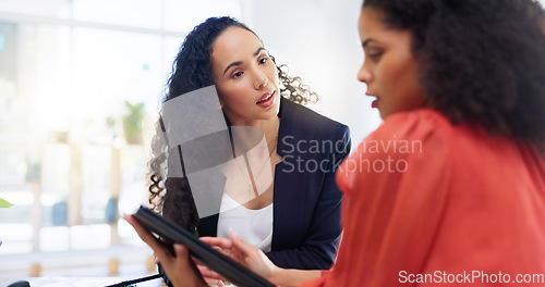 Image of Teamwork, tablet and business women in office helping coworker with project. Coaching, collaboration and intern in training talking to mentor with touchscreen technology for learning in company.