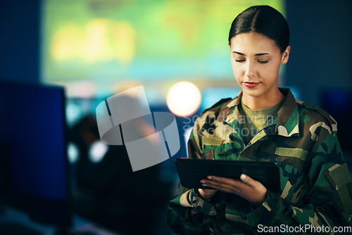 Image of Military, woman and working with tablet in surveillance, control room or technical support for army, officer or mission. USA, cybersecurity and person with online database, research or communication