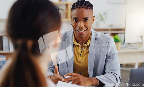 Image of Business, professional and black man with a client, planning and discussion in workplace for new project. Male consultant, employee and lady in office, discussion and explain schedule and deadline