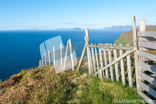 Image of fenced on mountains by the sea