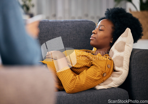 Image of Therapy, sofa and black woman relax in consultation for mental health, help and listening to communication. Psychologist, counselling and patient lying on couch in peace, calm and sleep in comfort