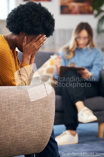 Image of Mental health, stress and psychology with a black woman in therapy, talking to a professional. Anxiety, depression or support with a young patient in session with a psychologist for grief counseling