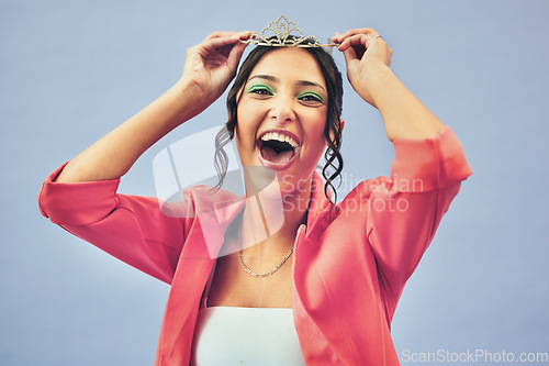 Image of Fashion, excited and portrait of woman with crown in studio for glamour, luxury and winning prize. Beauty, wow and person with tiara for princess pageant, winner and cosmetics on purple background