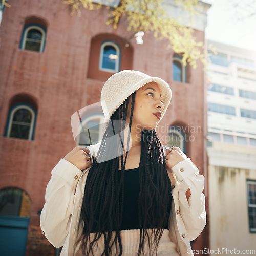 Image of Woman, travel and gen z fashion in city with thinking and freedom from urban adventure in New York, African female teenager relax, streetwear clothes and outdoor on a journey in town on a trip