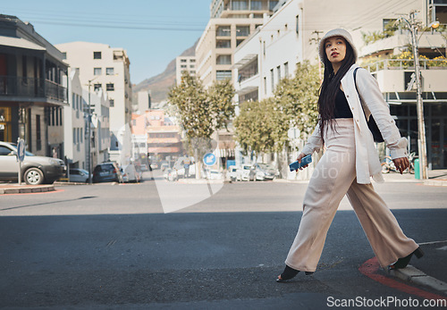 Image of Road, walking and woman with travel, commute and streetwear fashion in New York. Vacation, city street and urban with a female person with traveling and vacation on a trip for holiday adventure