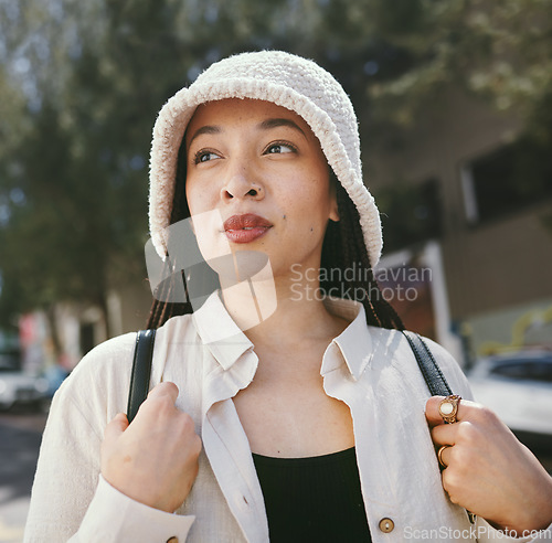 Image of Woman, thinking closeup and gen z fashion in city with travle and freedom from urban adventure in New York. Female teenager relax, streetwear and backpack and outdoor on a journey in town on a trip