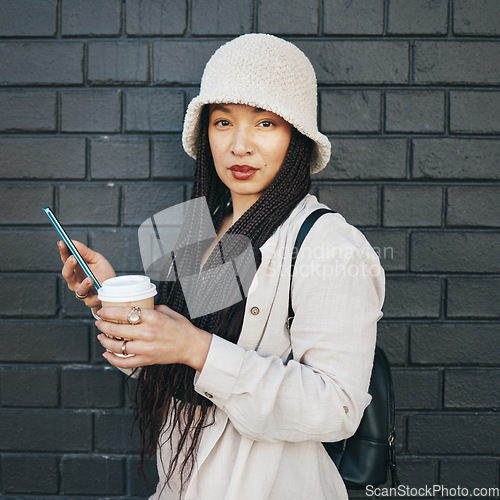 Image of City, portrait and coffee with a cellphone, woman or social media with sms on black wall background. Person, face or girl with smartphone, mobile user or outdoor with digital app, contact or espresso