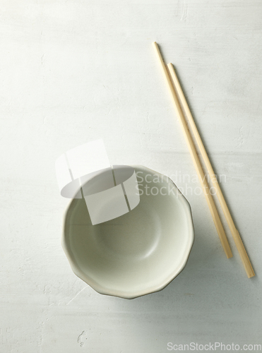 Image of empty bowl and chopsticks