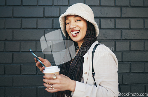 Image of Portrait of happy woman with phone, brick wall and urban fashion, social media chat and internet meme. Streetwear, gen z girl or online influencer with smartphone, smile and communication with coffee