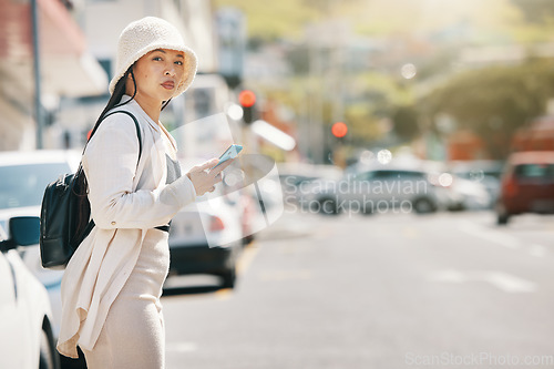 Image of Street, and woman waiting for taxi with phone and wall thinking about commute in city. Road, urban and female person with mobile in New York with travel, journey and holiday adventure on solo trip