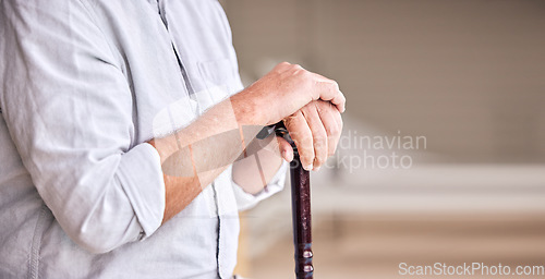 Image of Hands, walking stick and elderly person in home for support, healthcare and help in retirement. Closeup, banner and senior with disability for aid of parkinson, arthritis and rehabilitation of stroke