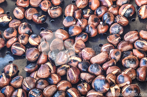 Image of Grilling chestnuts.