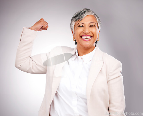 Image of Arm flex, business and woman with portrait, strong and winning on a white studio background. Happy ceo, mature person and accountant with strength, empowerment and career with freedom and employee