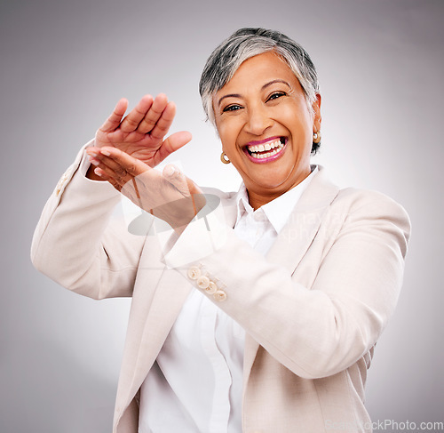 Image of Senior, business woman and portrait with clapping and celebration from success in studio. White background, elderly professional and smile with applause and happy from corporate job and support