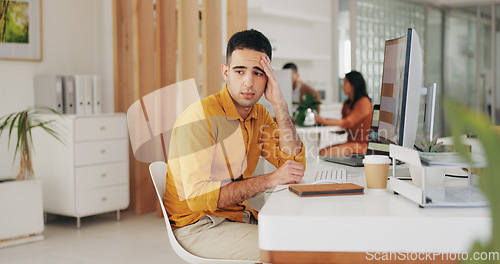 Image of Stress, depression and business man at table in office for challenge, financial crisis or bankruptcy in startup. Frustrated, anxiety and sad professional thinking of bad news, tax debt and mistake