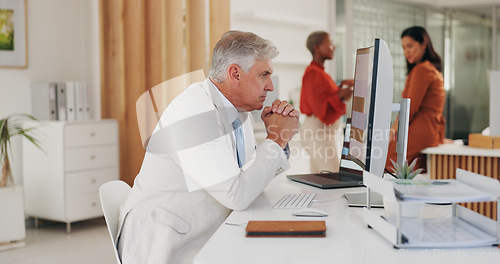 Image of Thinking, ceo and senior man on computer, reading email and planning in business office. Vision, idea and serious manager on pc brainstorming finance solution, problem solving and decision making