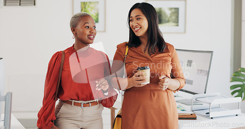 Image of Business people, walking and happy conversation in an office with coffee, smile or friendly chat. Work, friends and women with diversity, discussion or gossip, news or project, idea or communication