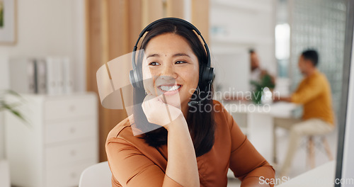 Image of Call center, woman and thinking with smile in office for CRM questions, FAQ contact and IT support. Happy asian telemarketing agent at computer of sales advisory, telecom solution or consulting ideas