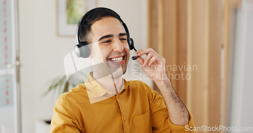 Image of Call center, man and consulting at computer with smile for CRM questions, FAQ contact and IT support. Happy telemarketing agent, salesman and communication of telecom advisory, solution and help desk