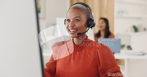 Image of Call center, black woman and consulting at computer in office for CRM questions, FAQ contact and IT support. Happy telemarketing agent at desktop for sales advisory, telecom solution and offer help